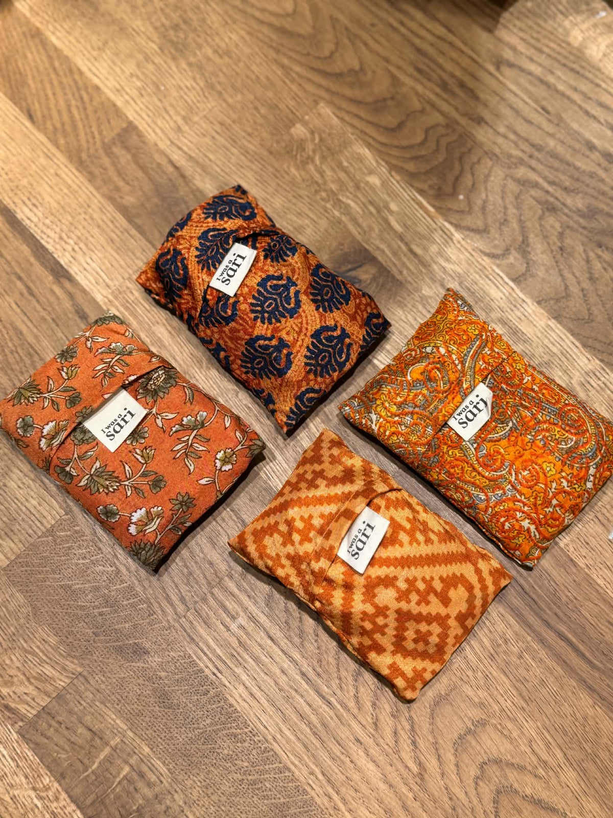 Sammenleggbare handlenett i oransje og rust